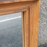 Square mirror in old wood