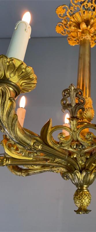 Golden bronze lustre 8 bras de lumière, france first half of the 19th century