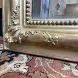 Louis Philippe period mirror in gilded stucco 100x147cm