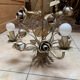Paire de lustre decor de roses dorées