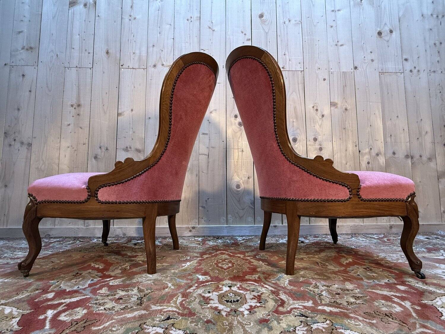 Pair of Louis Philippe armchairs in walnut and pink velvet.