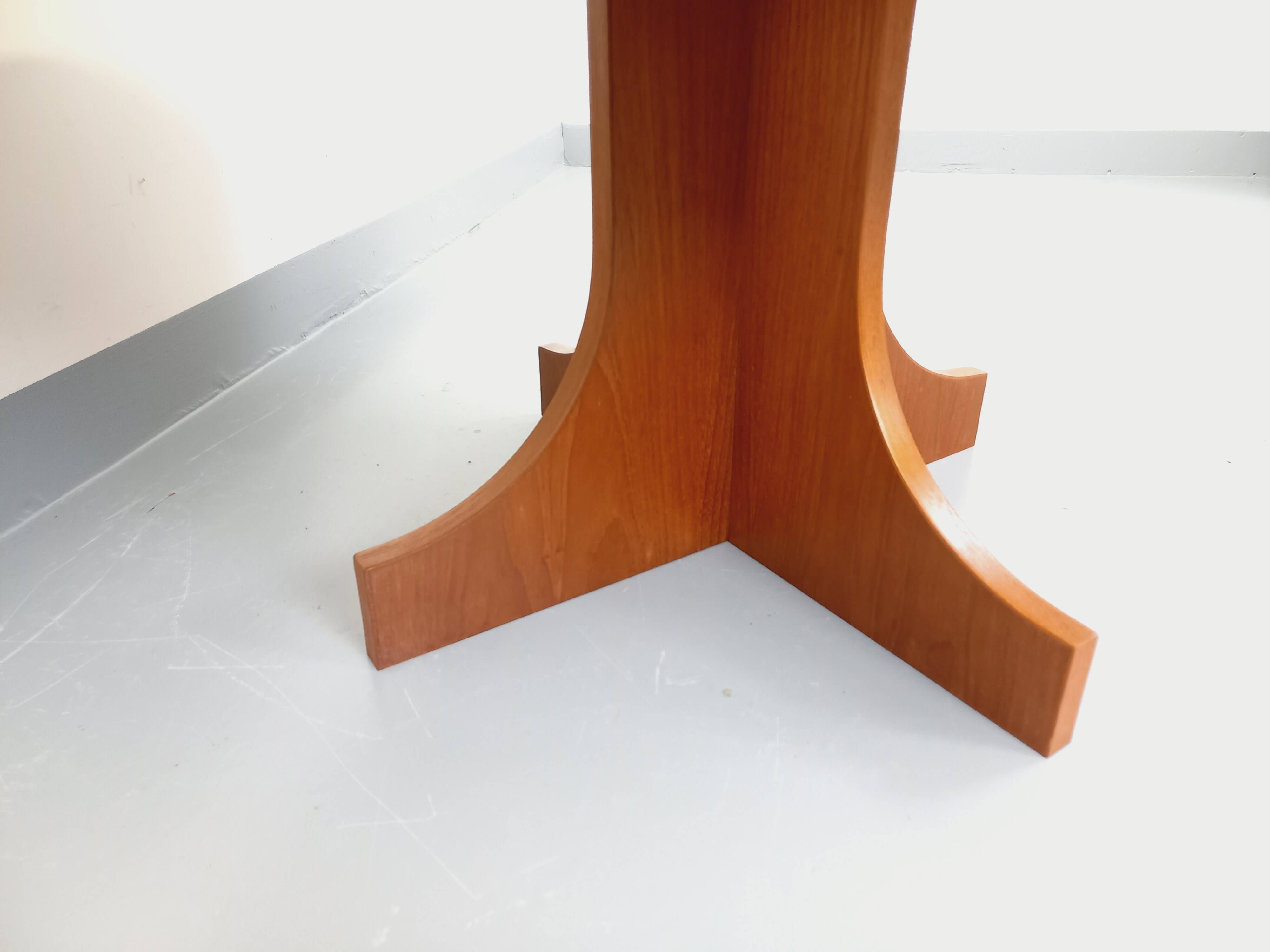 Vintage English round teak coffee table from the 1960s