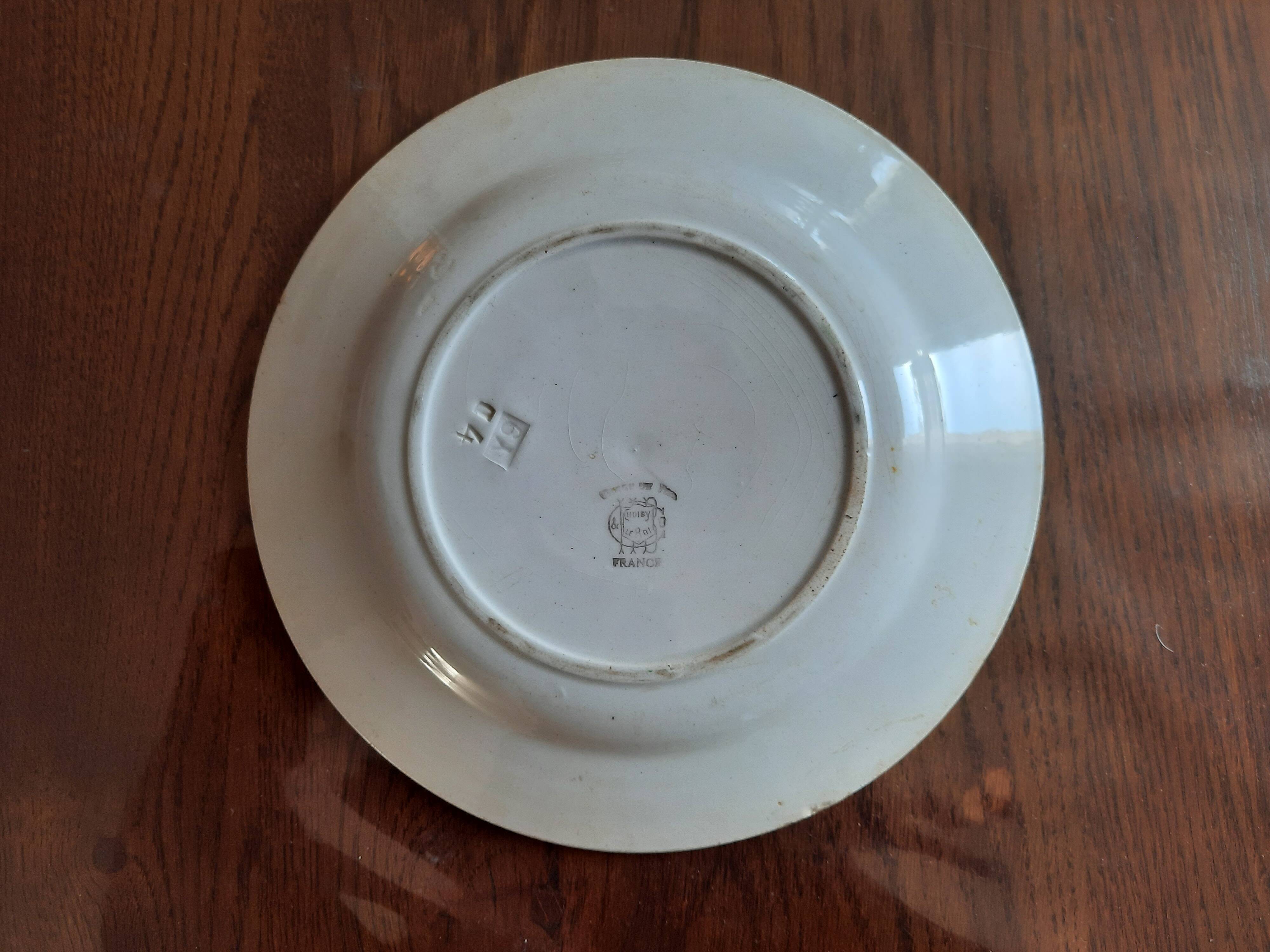 Two rooster plates