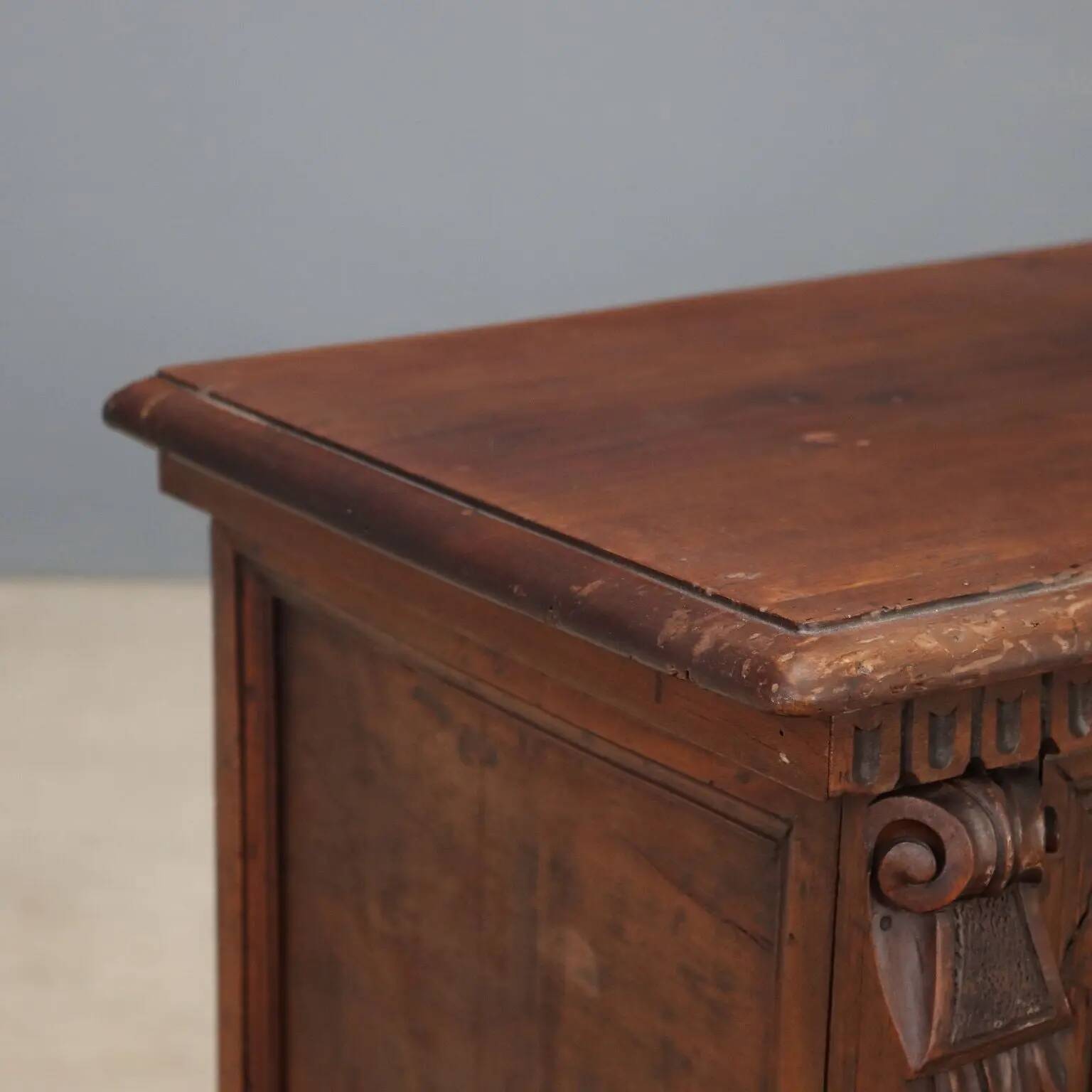 Walnut chest with baroque carvings
