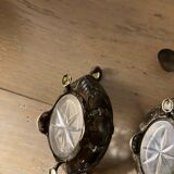 Salt and pepper shakers with silver spoons