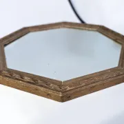 Octagonal mirror in carved wood