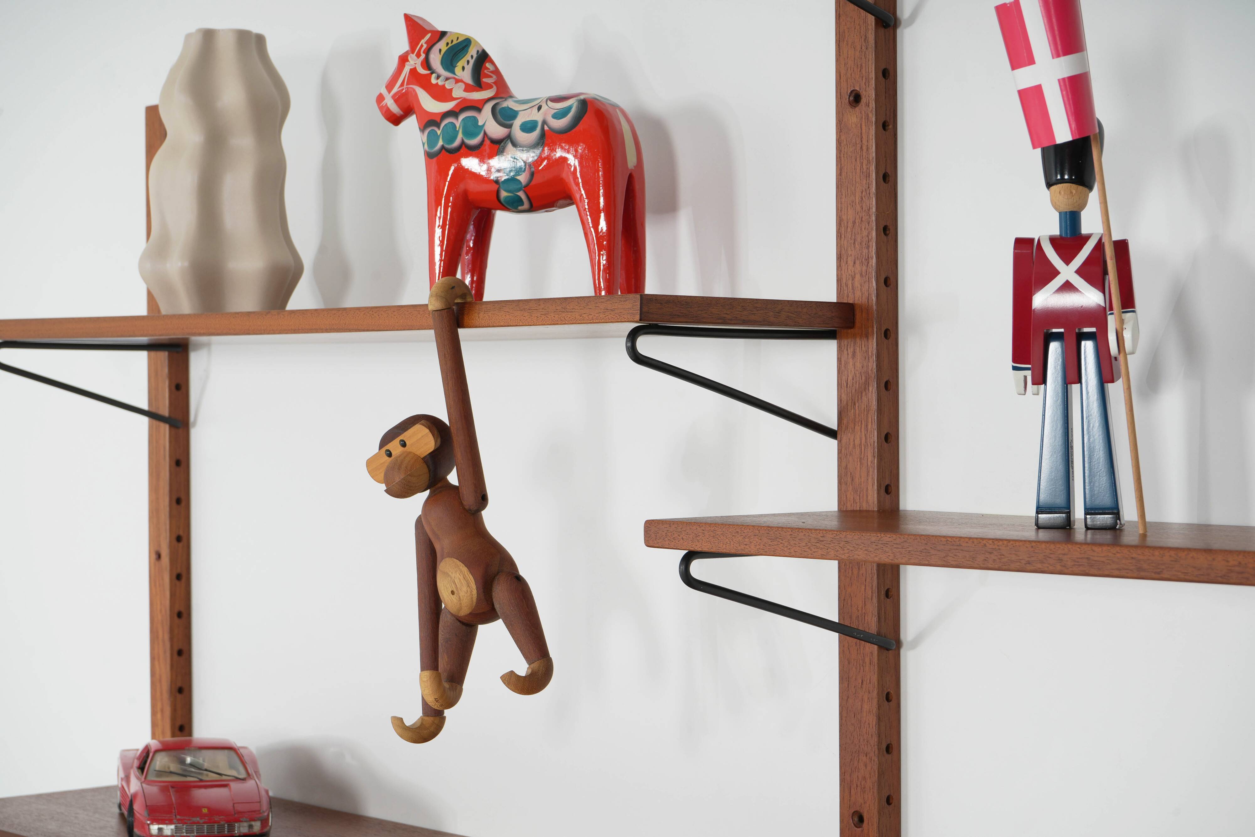 Modular shelving from the 1960s — Danish teak veneer wall system