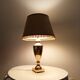 Art deco living room lamp in golden brass from the 1950s