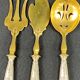 Suite of 3 dessert service elements with silver handles and sprinkler spoon