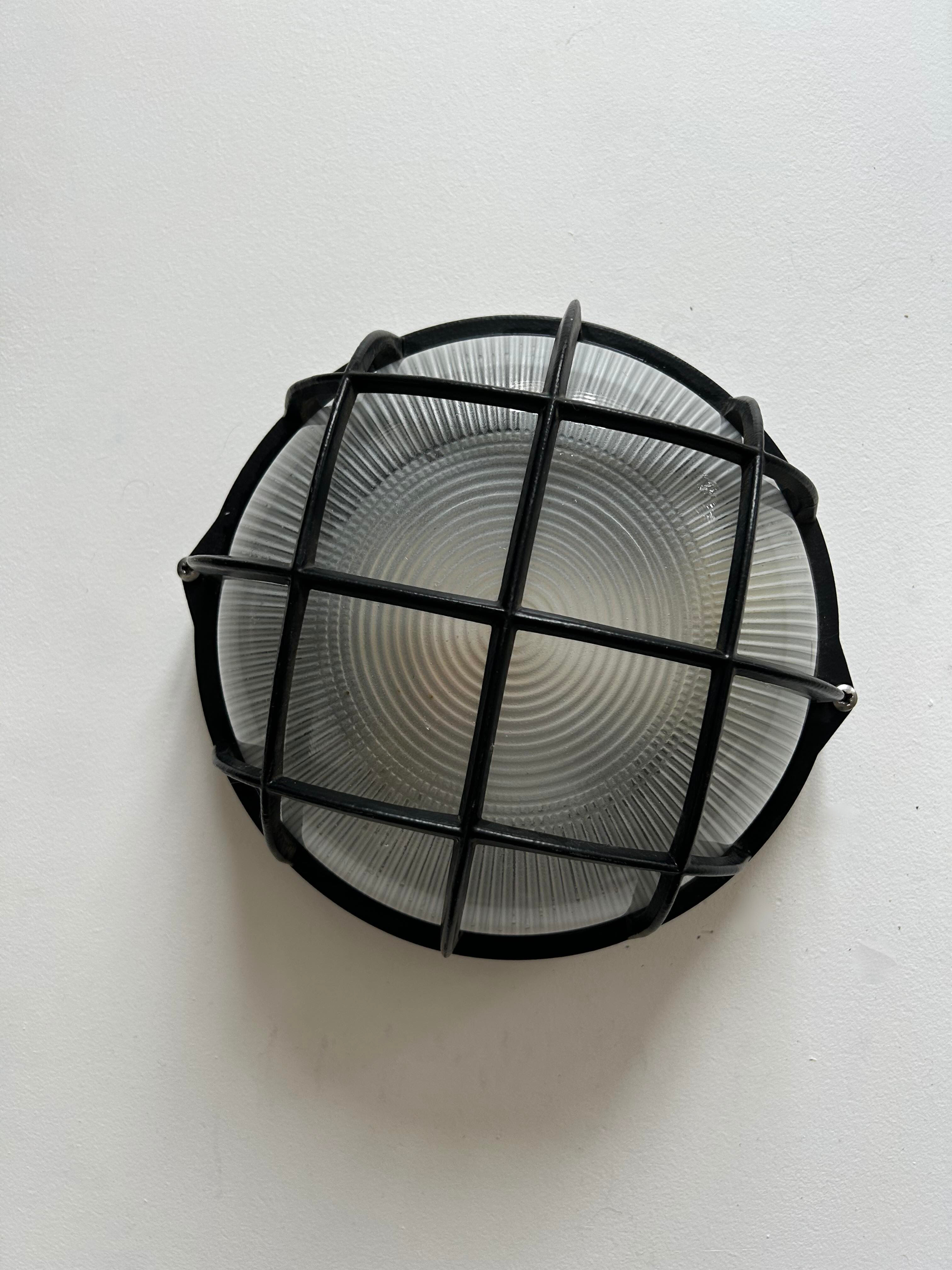 Vintage wall lamp, black metal and ridged glass, France 1980.