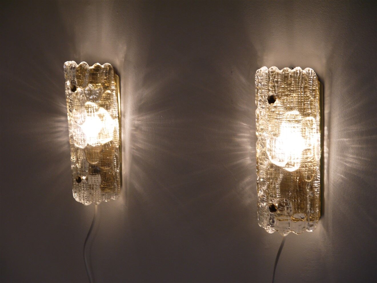 Pair of crystal and brass wall lamps by Carl Fagerlund for Orrefors