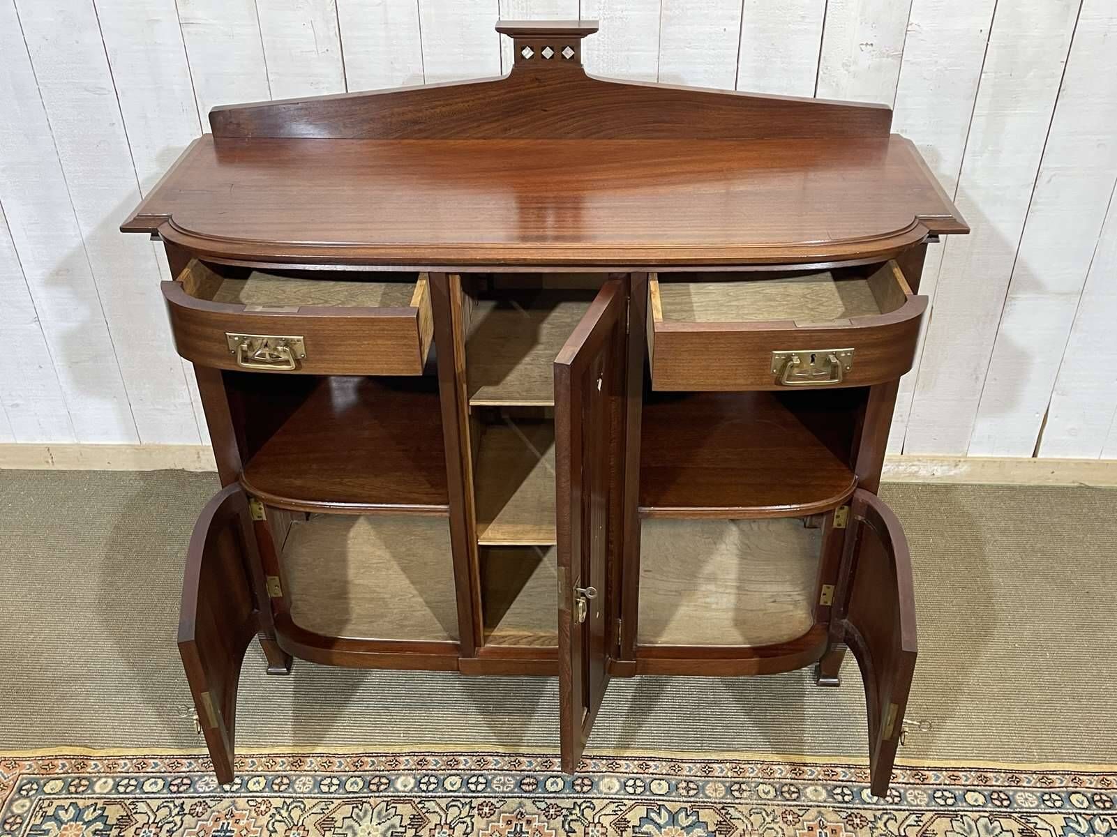 Mahogany sideboard from the Art Nouveau period in the style of Gustave Serrurier-Bovy.