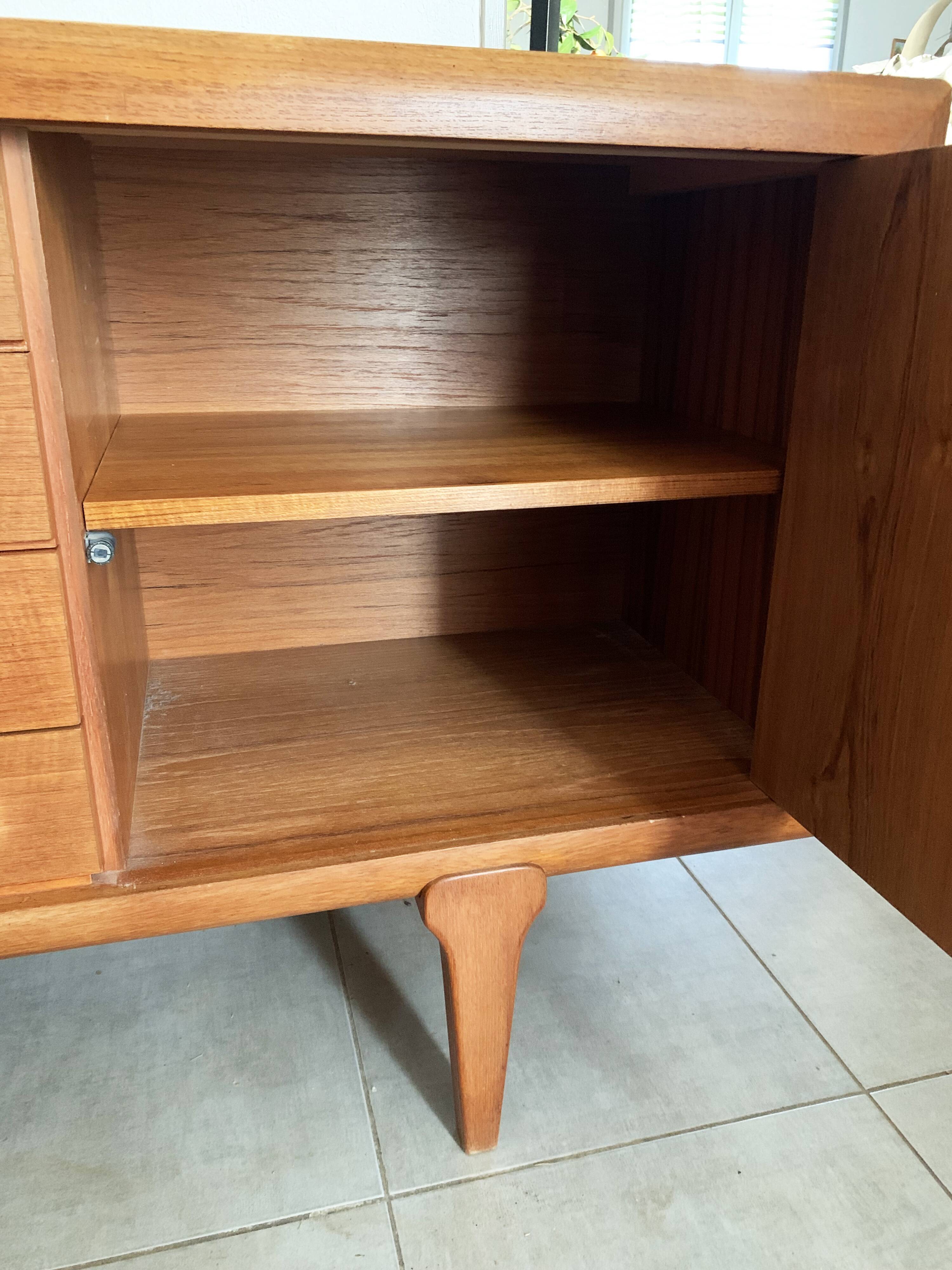 Large Danish vintage row in blond teak from the 60s