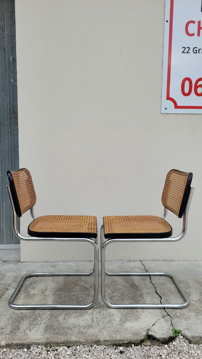 Pair of chairs by Marcel Breuer in black canework model B32 signed Italy