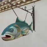 Panel depicting a fish in sheet metal