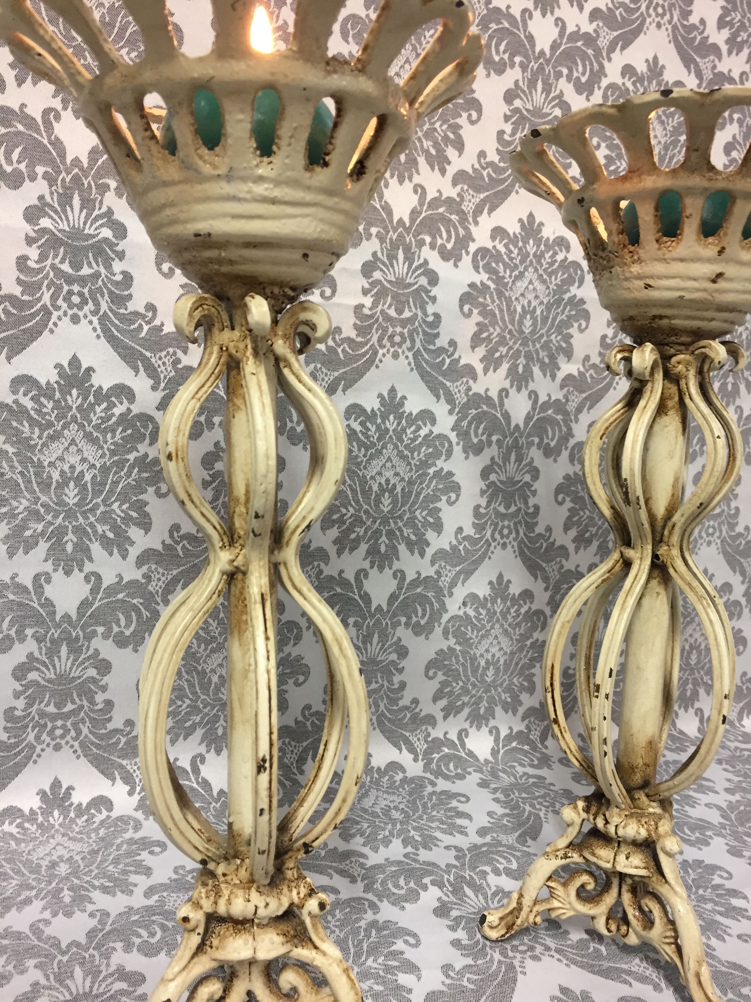 Pair of candlesticks patinated cast iron renaissance design
