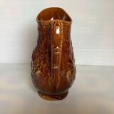 Brown pitcher with rose motifs