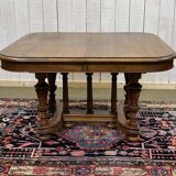 Henri II walnut table from the early 20th century with extensions.