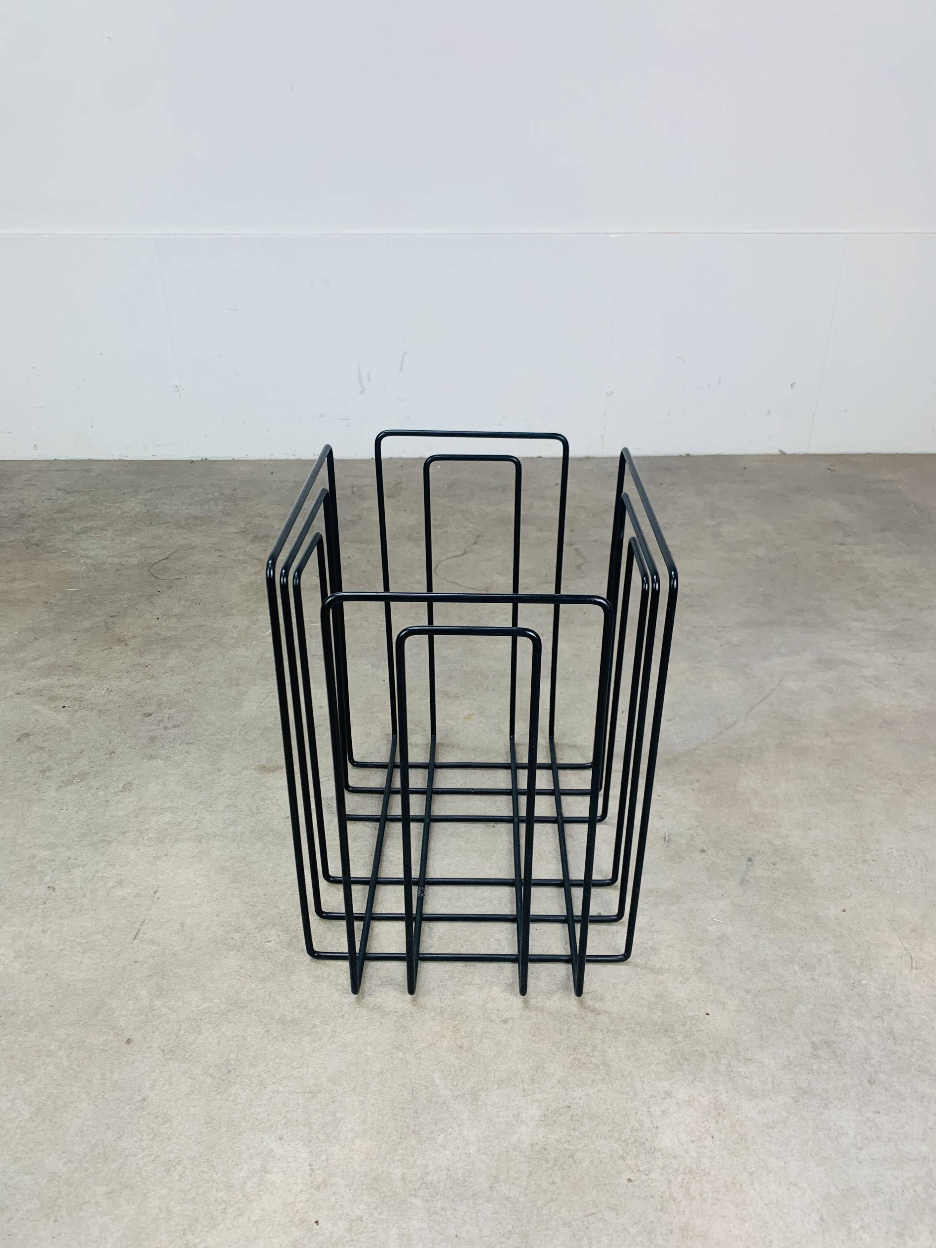 Black metal magazine rack by Willy Glaeser for TMP, 1980s.