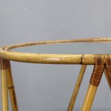 1960s Italian rattan coffee table with glass top, mid-century round design