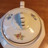 Coffee maker with floral decoration