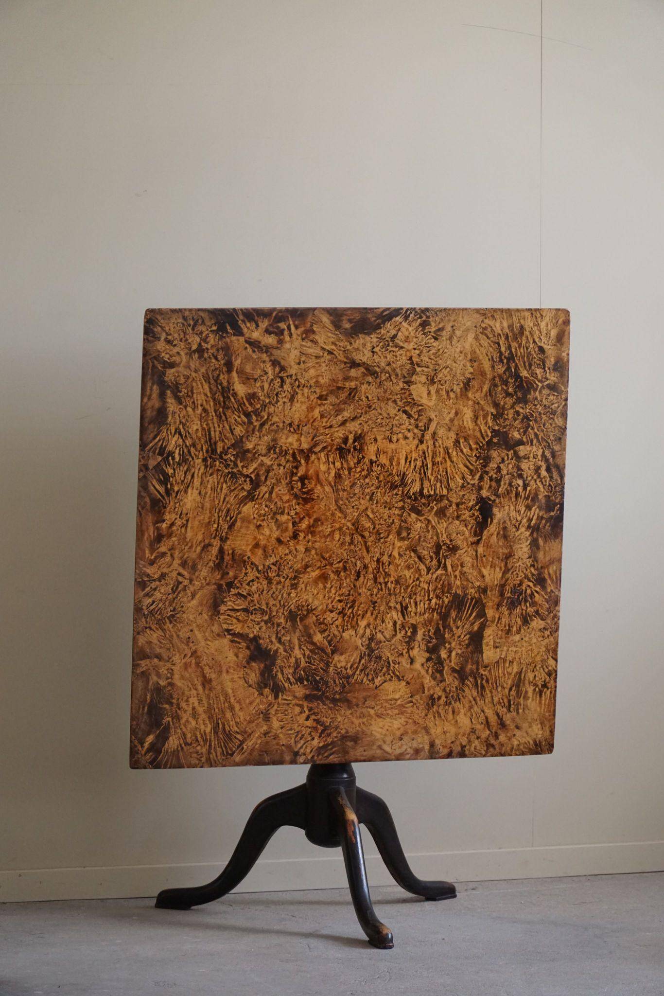 Antique square table with drop leaves made of burl wood, handcrafted in Sweden, 19th century.