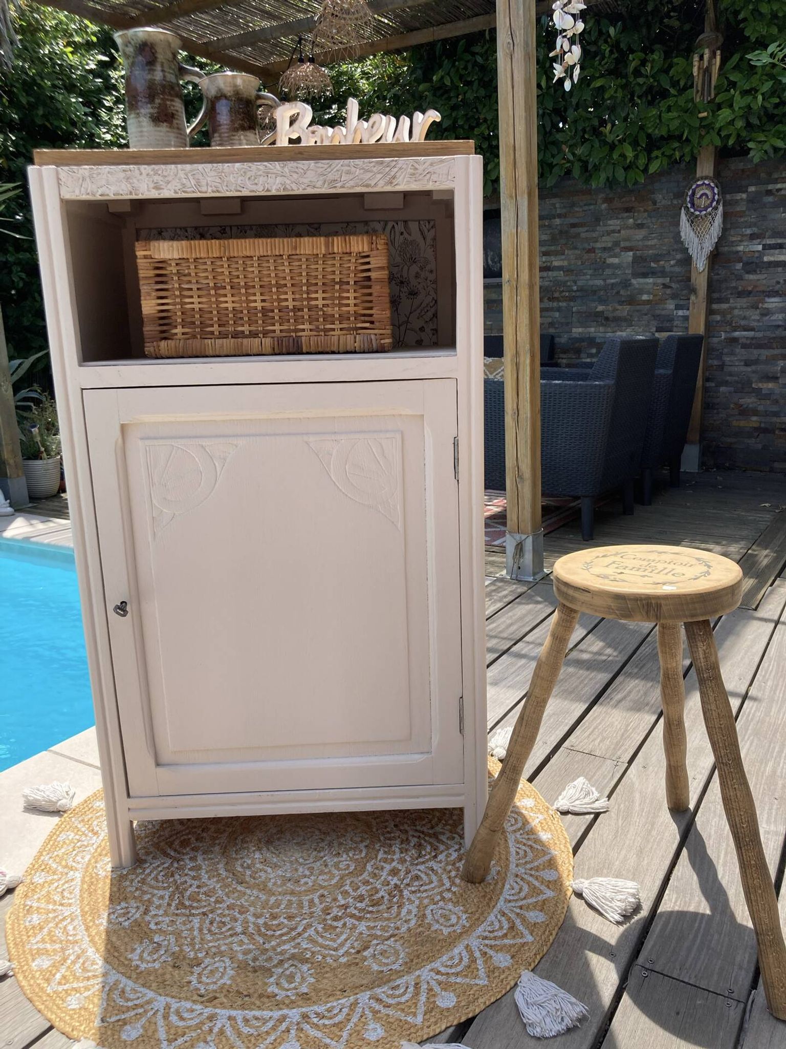 Beautiful art deco jam cupboard in delicate beige tone / and wicker basket