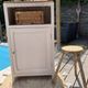 Beautiful art deco jam cupboard in delicate beige tone / and wicker basket