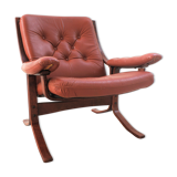Scandinavian armchair made of wood and cognac leather