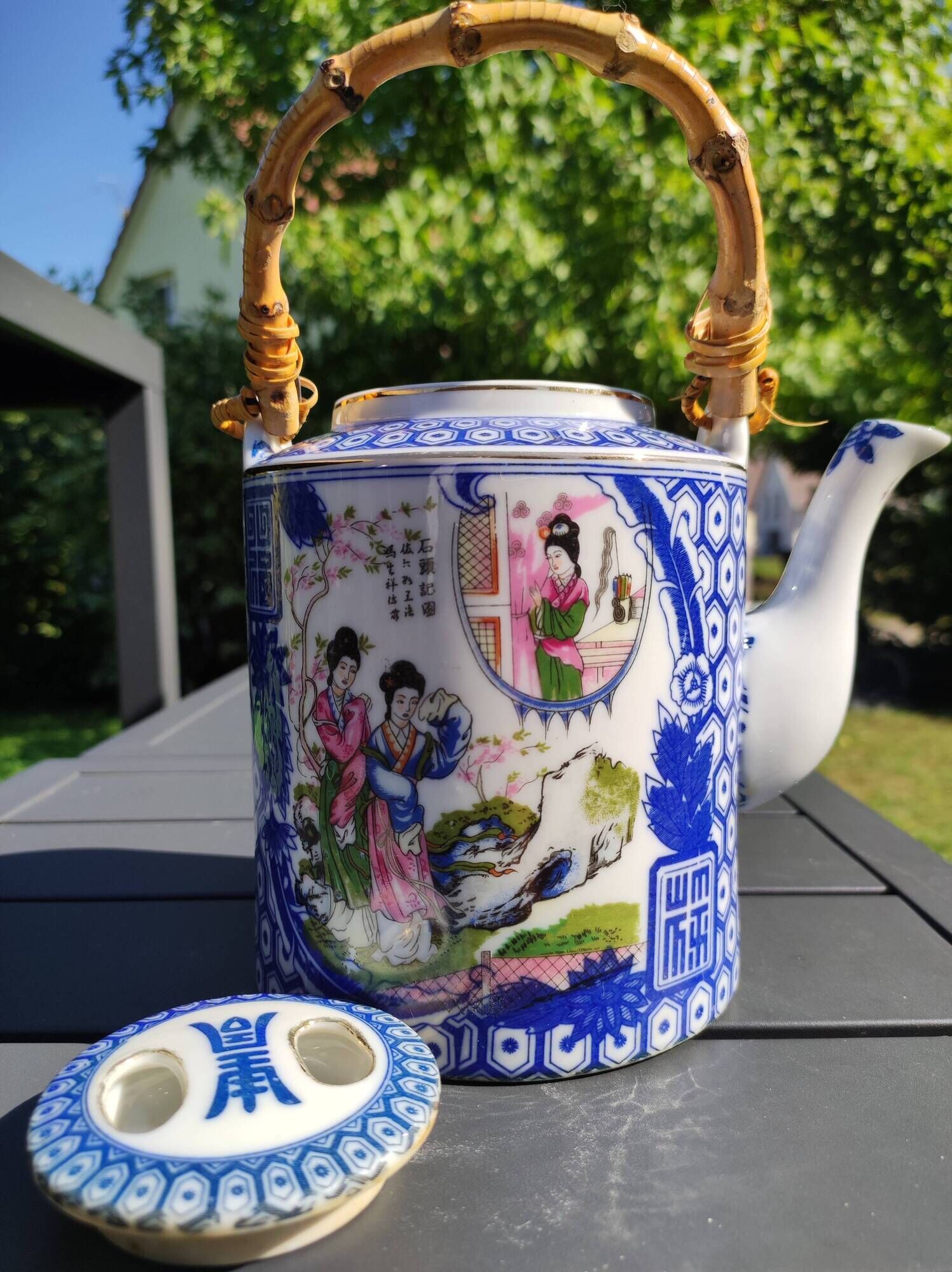 Asian, Japanese fine porcelain teapot with woven bamboo handle, vintage 50s