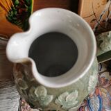 Pitcher decorated with bunches of grapes