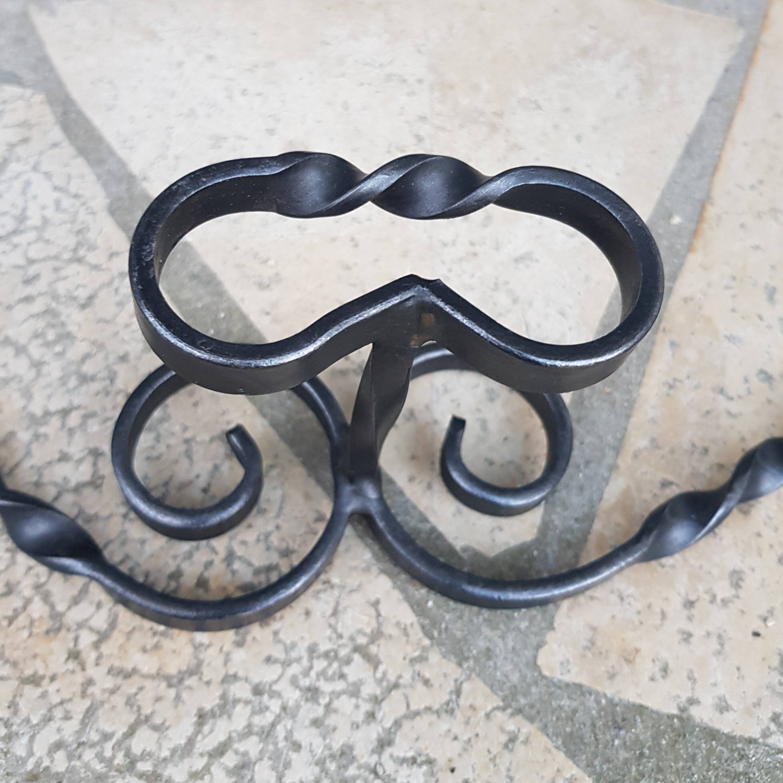 Wrought iron wall coat rack