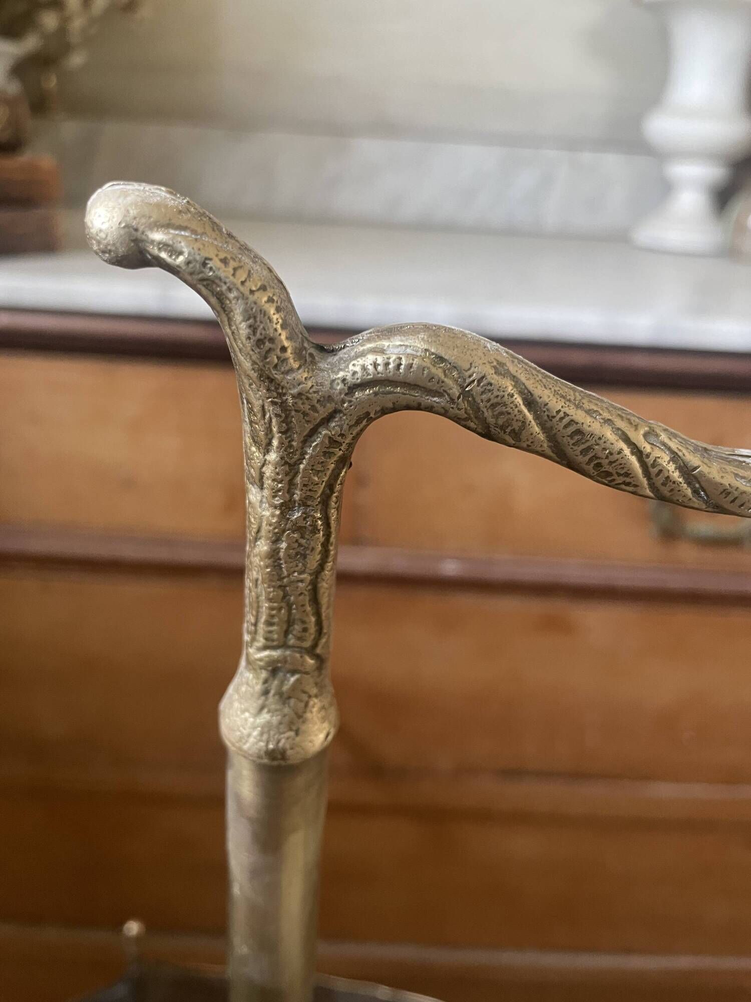 Antique repoussé brass umbrella stand