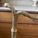 Antique repoussé brass umbrella stand