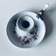 Antique enamelled metal candle holder