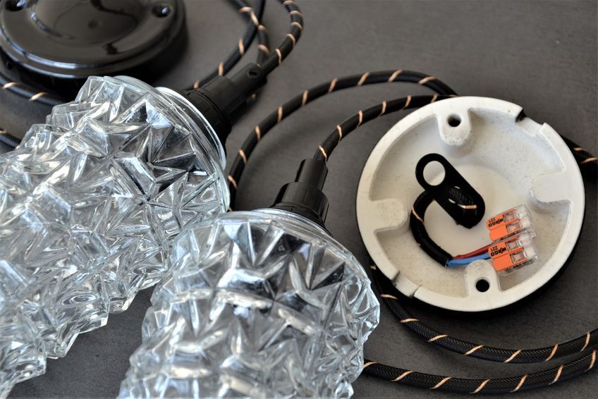 Pair of high-rise suspensions in chiseled glass - spindle shape of the 50s 60's -