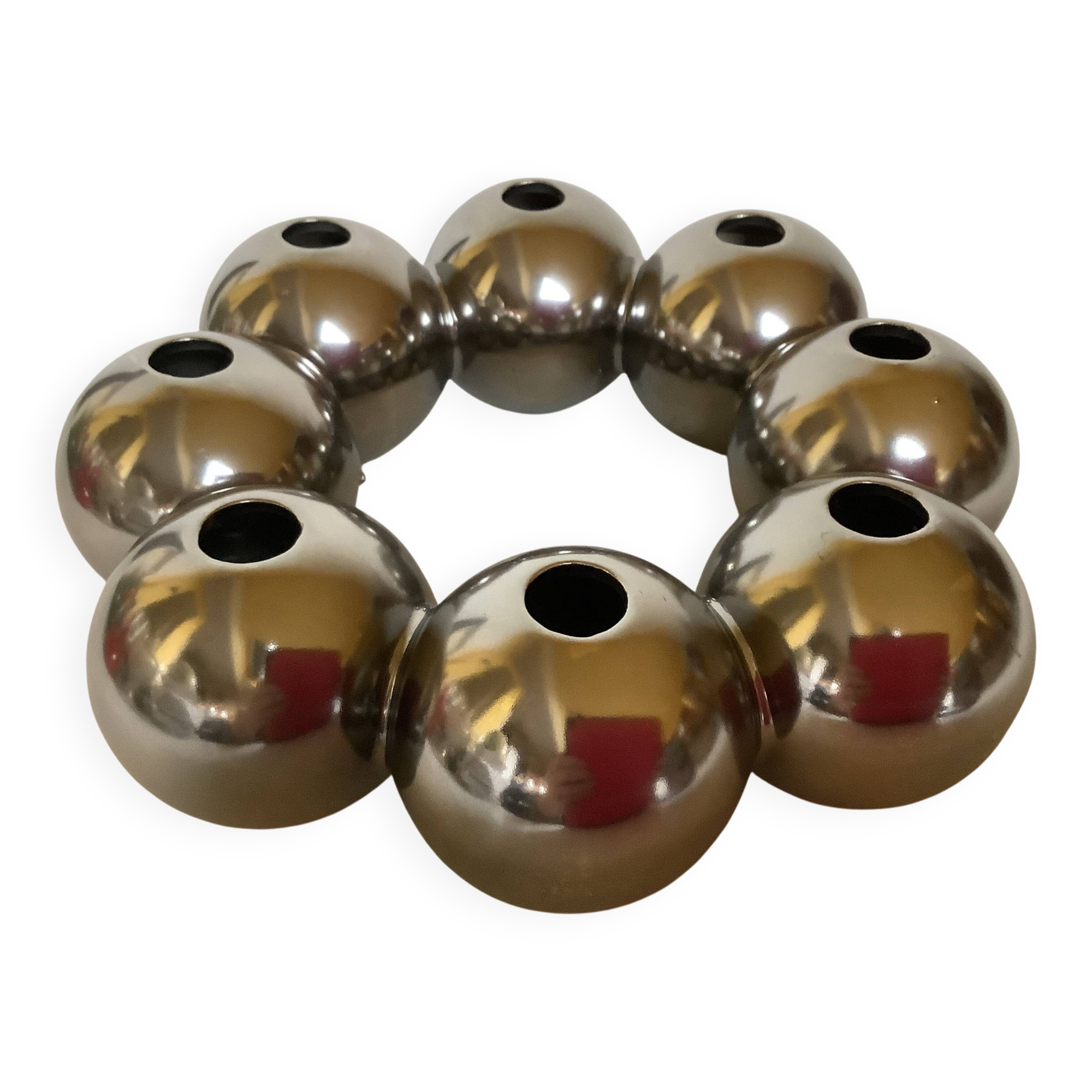 Silver flower vase in a crown shape.