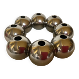 Silver flower vase in a crown shape.