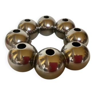 Silver flower vase in a crown shape.