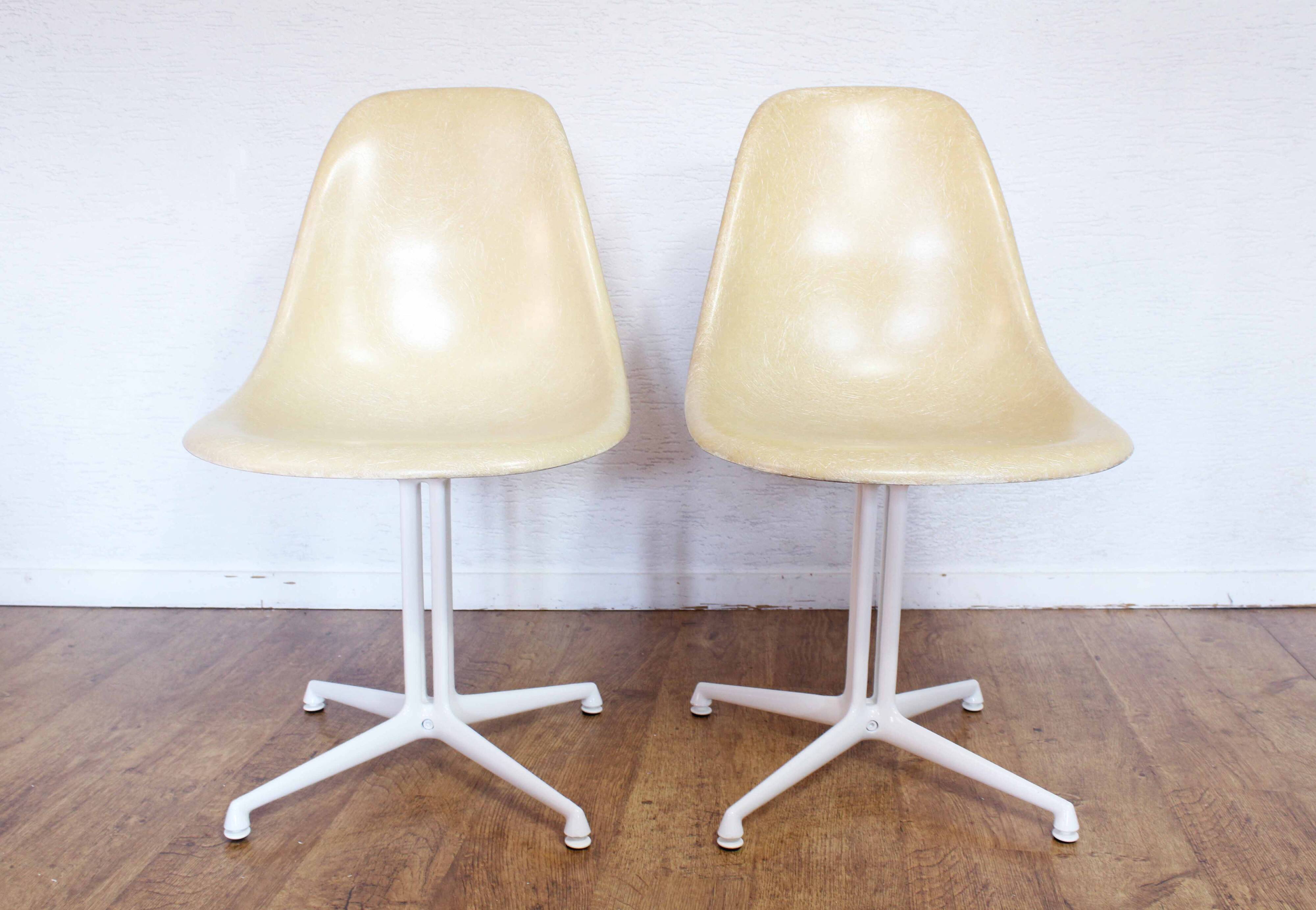 Pair of EAMES La Fonda fiberglass chairs 1970