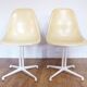 Pair of EAMES La Fonda fiberglass chairs 1970