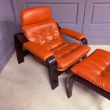 Vintage 1970s armchair with ottoman, leather and wood