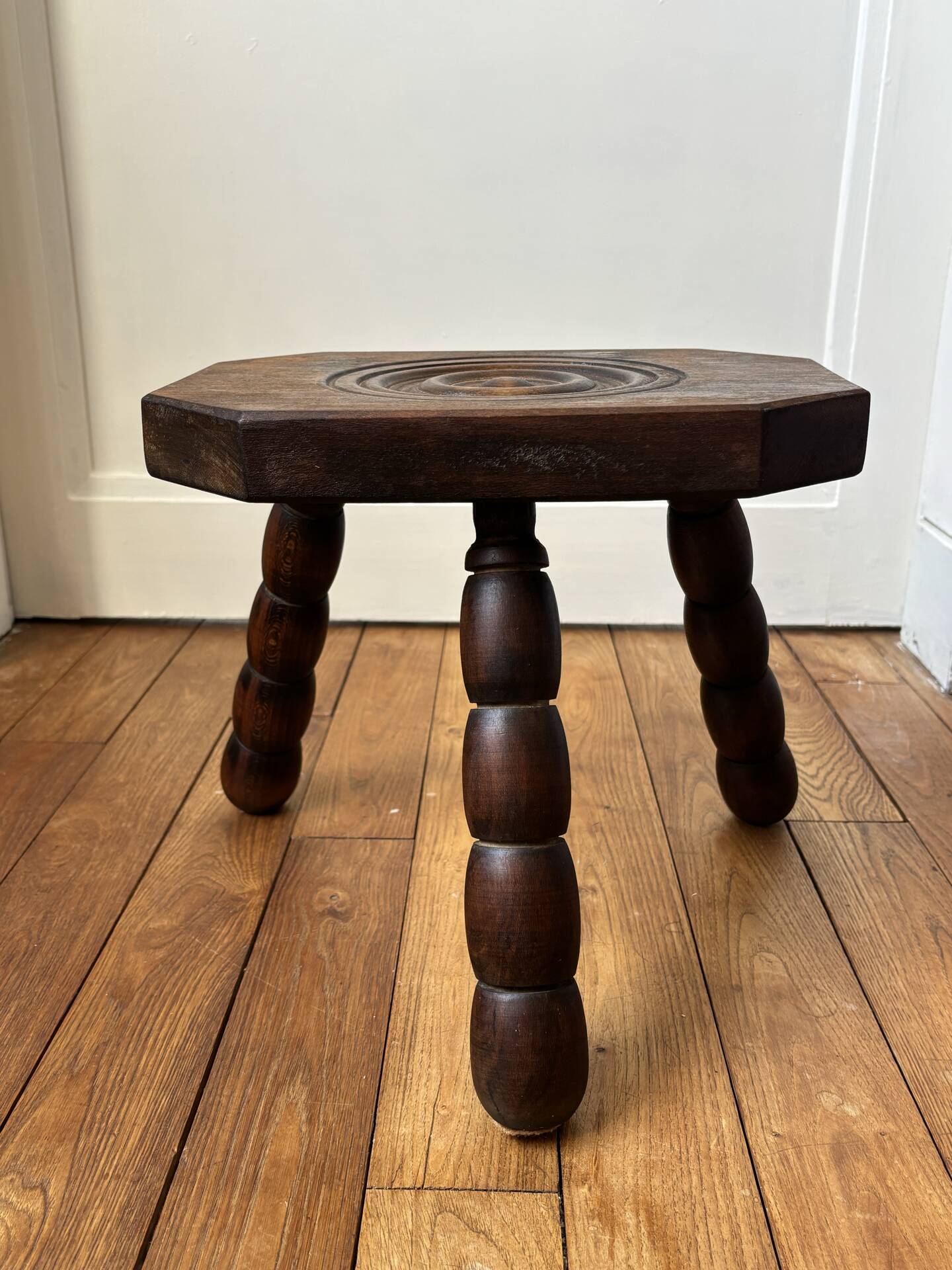 Wooden tripod stool