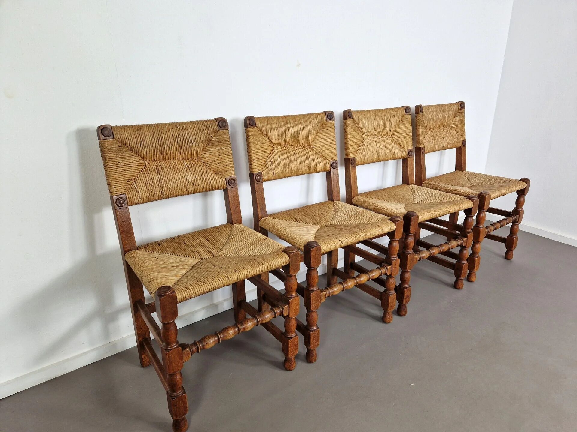 Set of French primitive rush chairs | 1930s