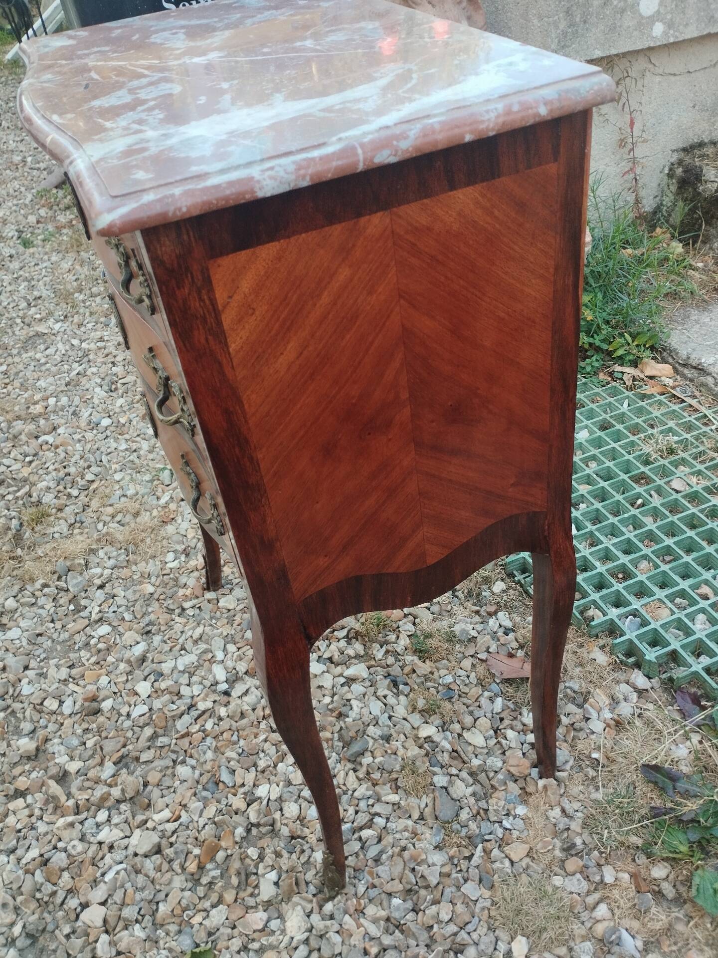 Antique marquetry commode with marble top in Louis XVI style.