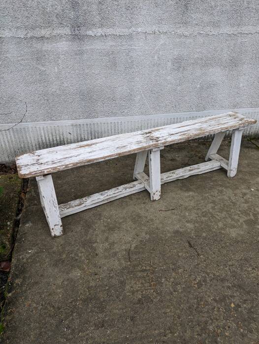 Old bench limed in white