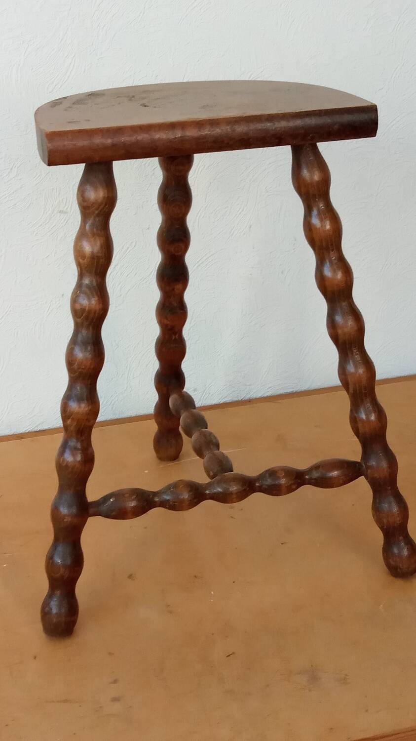 Beaded leg tripod stool