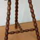 Beaded leg tripod stool