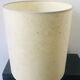 Table lamp with rattan base and papier-mâché hat