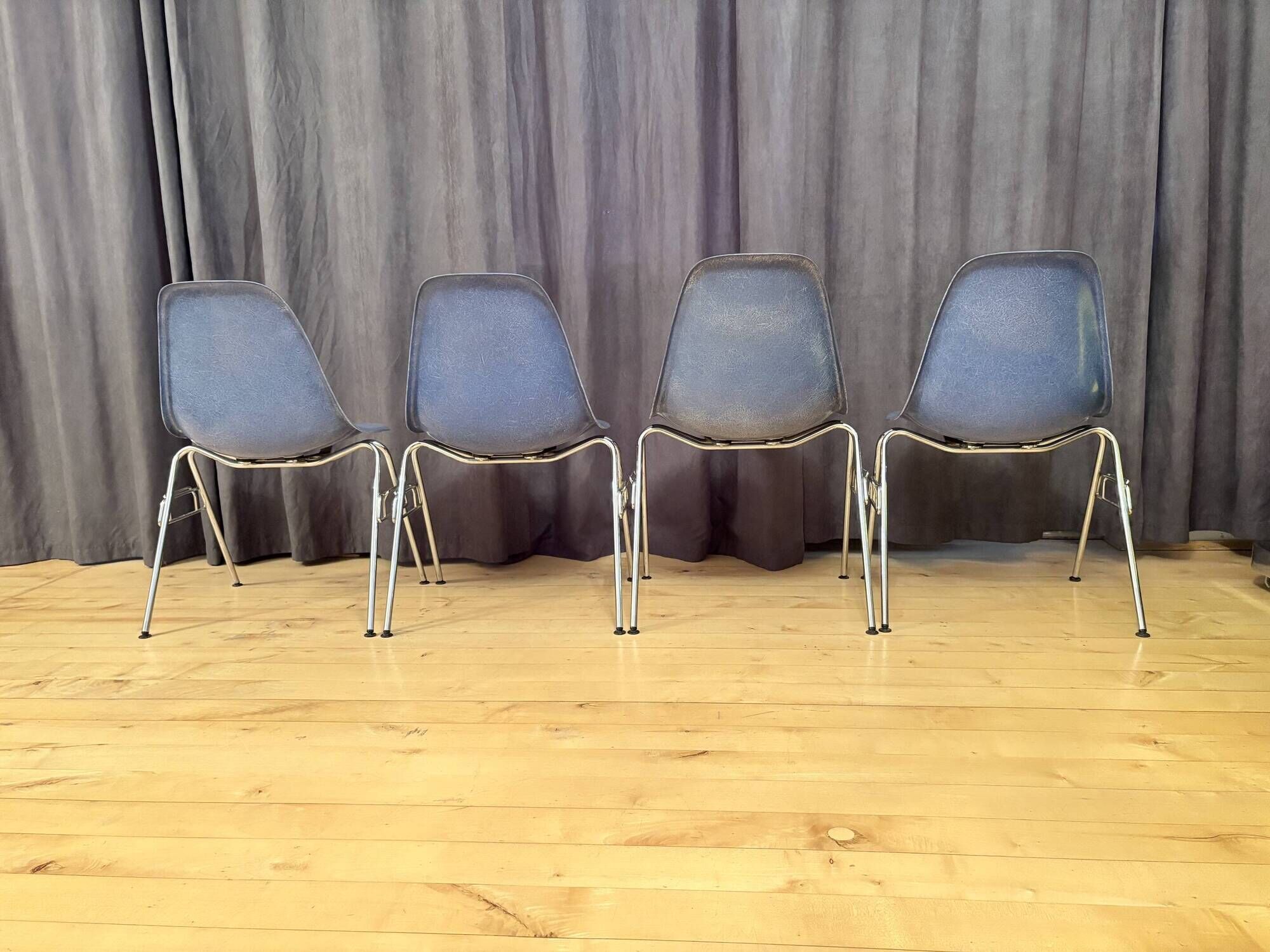 Set of four DSS chairs, fiberglass, designed by Charles and Ray Eames, Herm